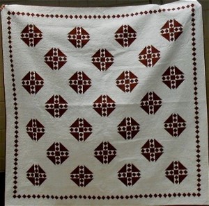 Red and White Block Quilt